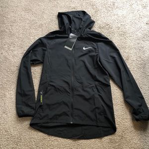 black nike running jacket.